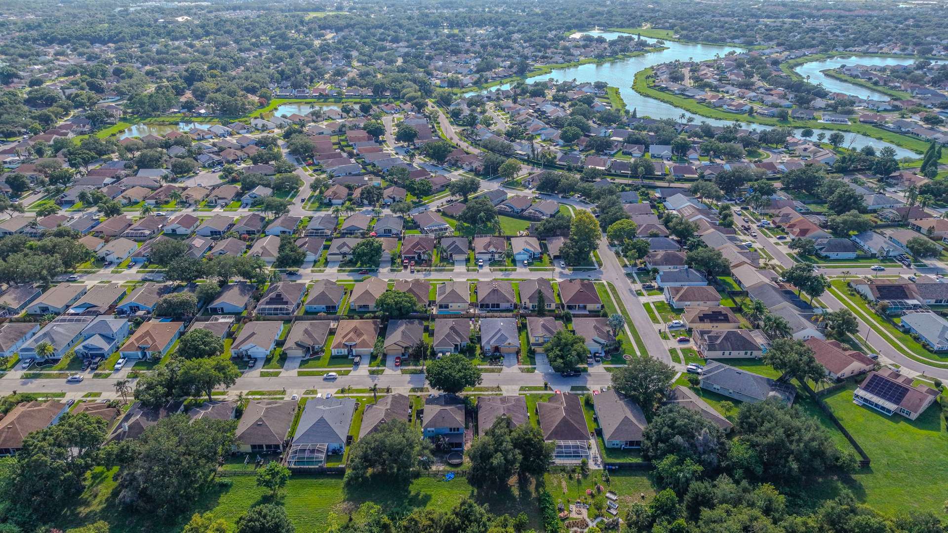 Aerial view of a Central Florida neighborhood surrounded by lakes